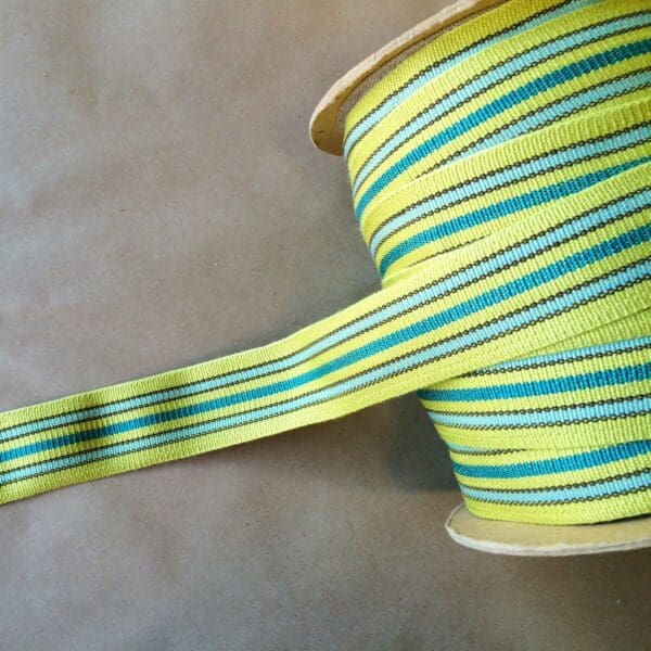 A spool of Eden 1.5 and 2IN Tapes-Indoor and Outdoor ribbon.
