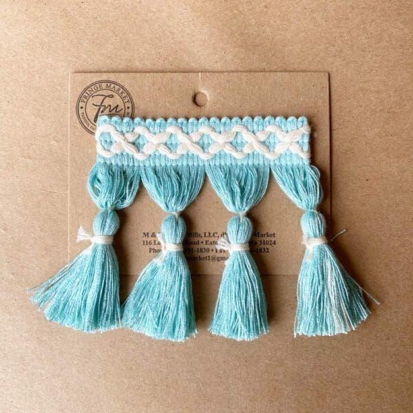 Turquoise Frills Tassel Fringe 3.5 IN with white Frills Tassel Fringe 3.5 IN.