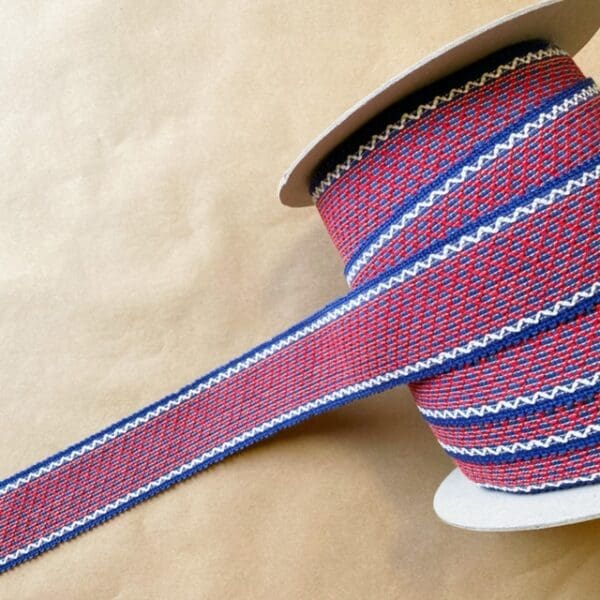 A Camlet and Camlet Wool 2.25 with red and blue stripes.