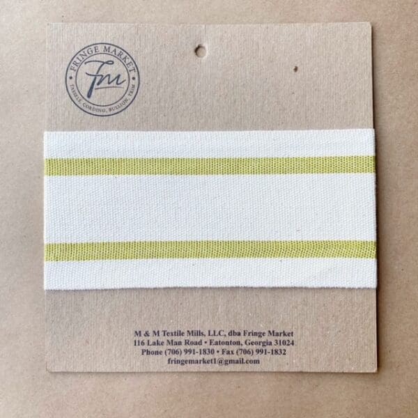 A yellow and white stripe on a piece of paper.