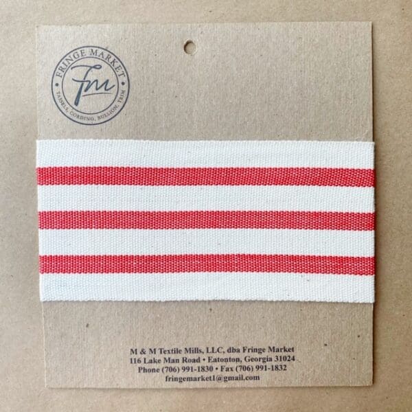 A red and white stripe on a piece of paper.