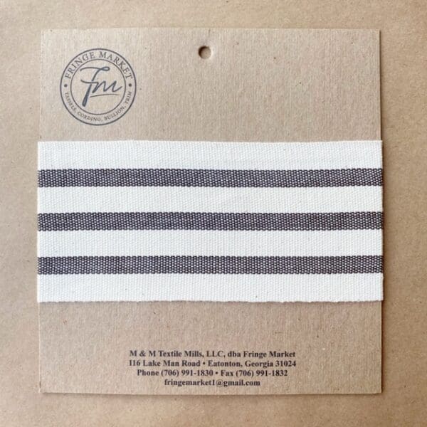 A card with a white and gray stripe on it.
