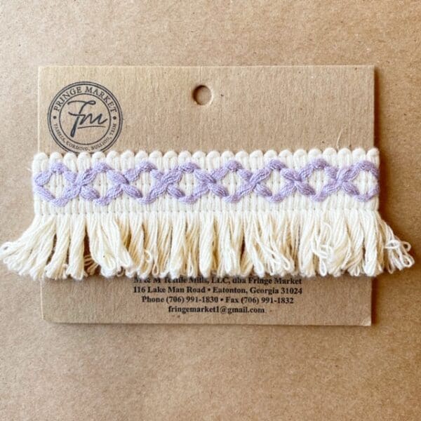 A card with a Loopy Fringe 1.5 IN embroidered fringe.