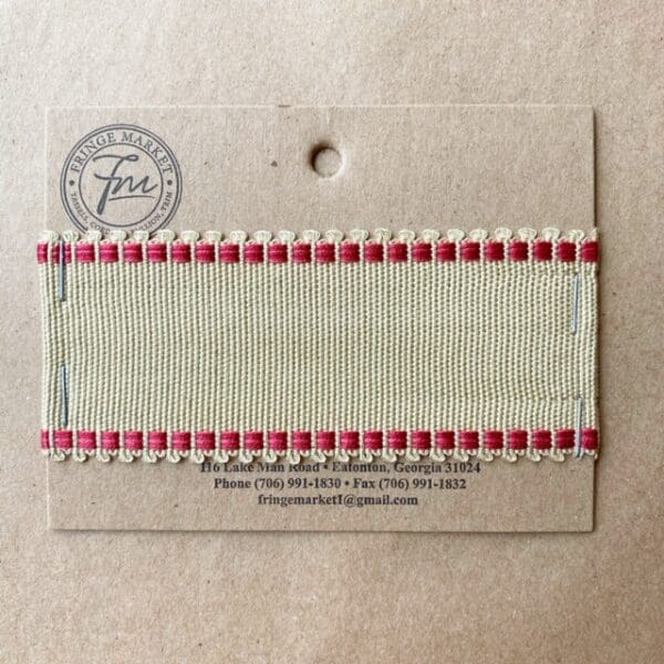 A card with a Picot Grosgrain 1 3/4 IN ribbon on it.