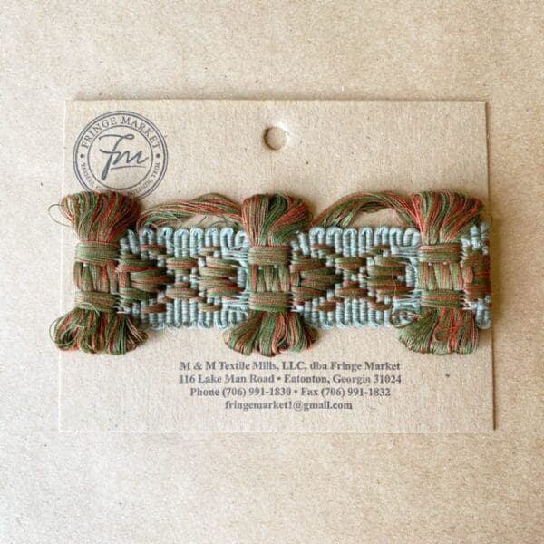 A green and brown Bow Tie Braid 1 3/4 IN ribbon on a card.