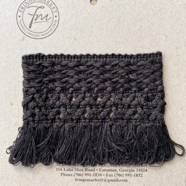 A black crocheted fringe on a Bijoux Wide Tapes.