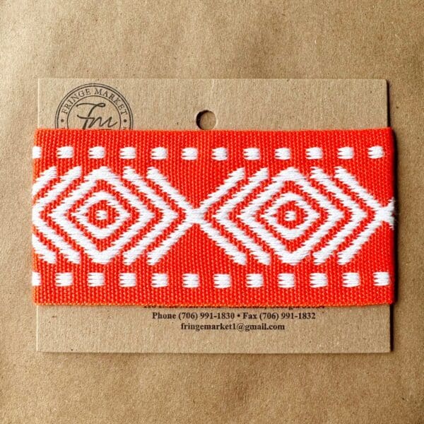 A red and white Sonora Outdoor Tapes with an aztec pattern.