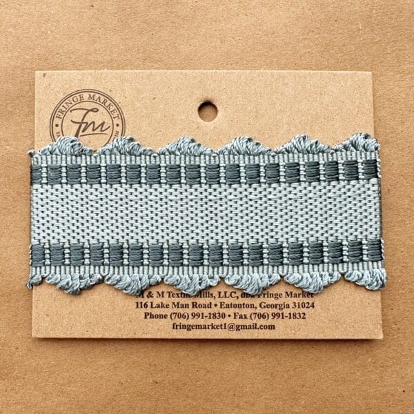 A card with a Chelsea Silk Braids lace trim.