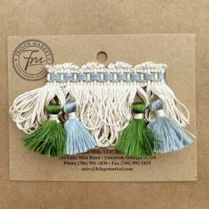 Yorkville Silk Tassel Fringe with green and blue tassels on a card.