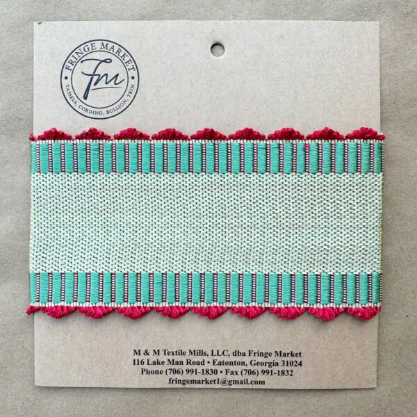 A small piece of Madison Ave 3.5 in Silk Tape with a pink and turquoise trim.