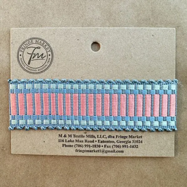 A blue and pink striped Amity Silk Braids ribbon on a card.