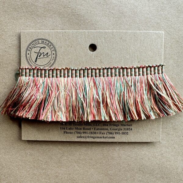 A small piece of Silk 100% Cut Brush Fringe 1.5in with fringes on it.